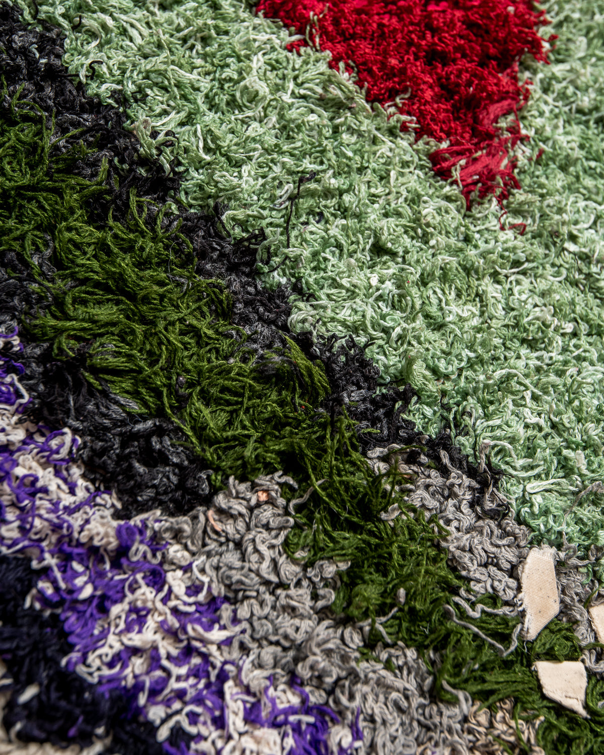 Modern designer vintage handcrafted Berber rug from Morocco. Boucherouite runner rug with beautiful colors and patterns.